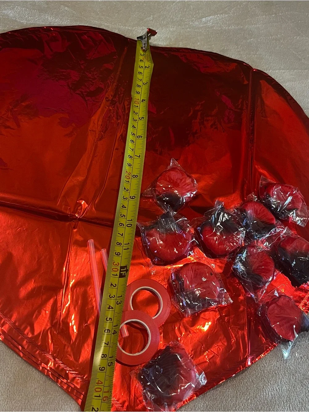 Love and Heart-Shaped Aluminum Foil Balloons, ribbon and rose petals